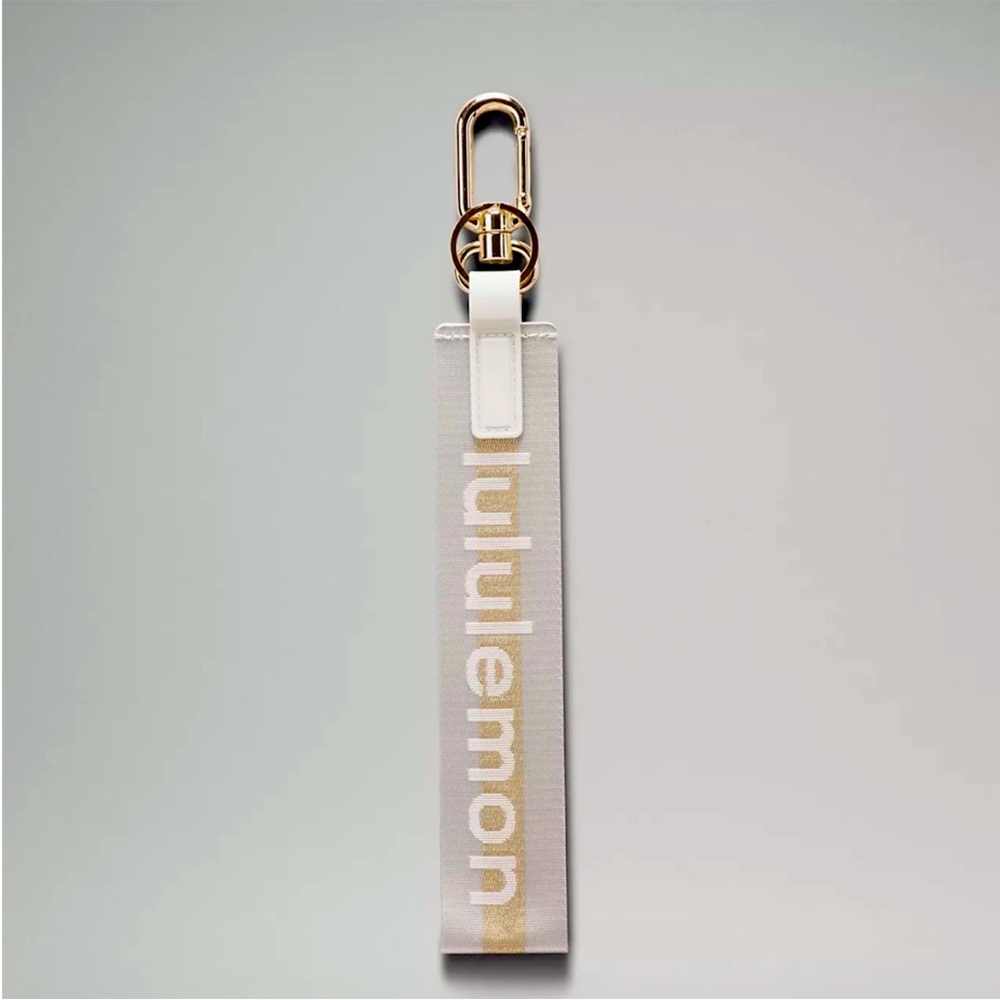 ✨🆕 Lululemon Never Lost Key Chain *Wordmark Vapor/Gold /White✨SOLD OUT